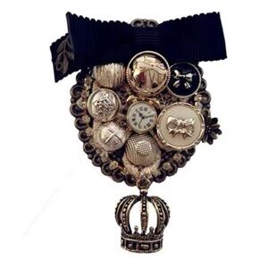 Elegant Black and Gold Brooch